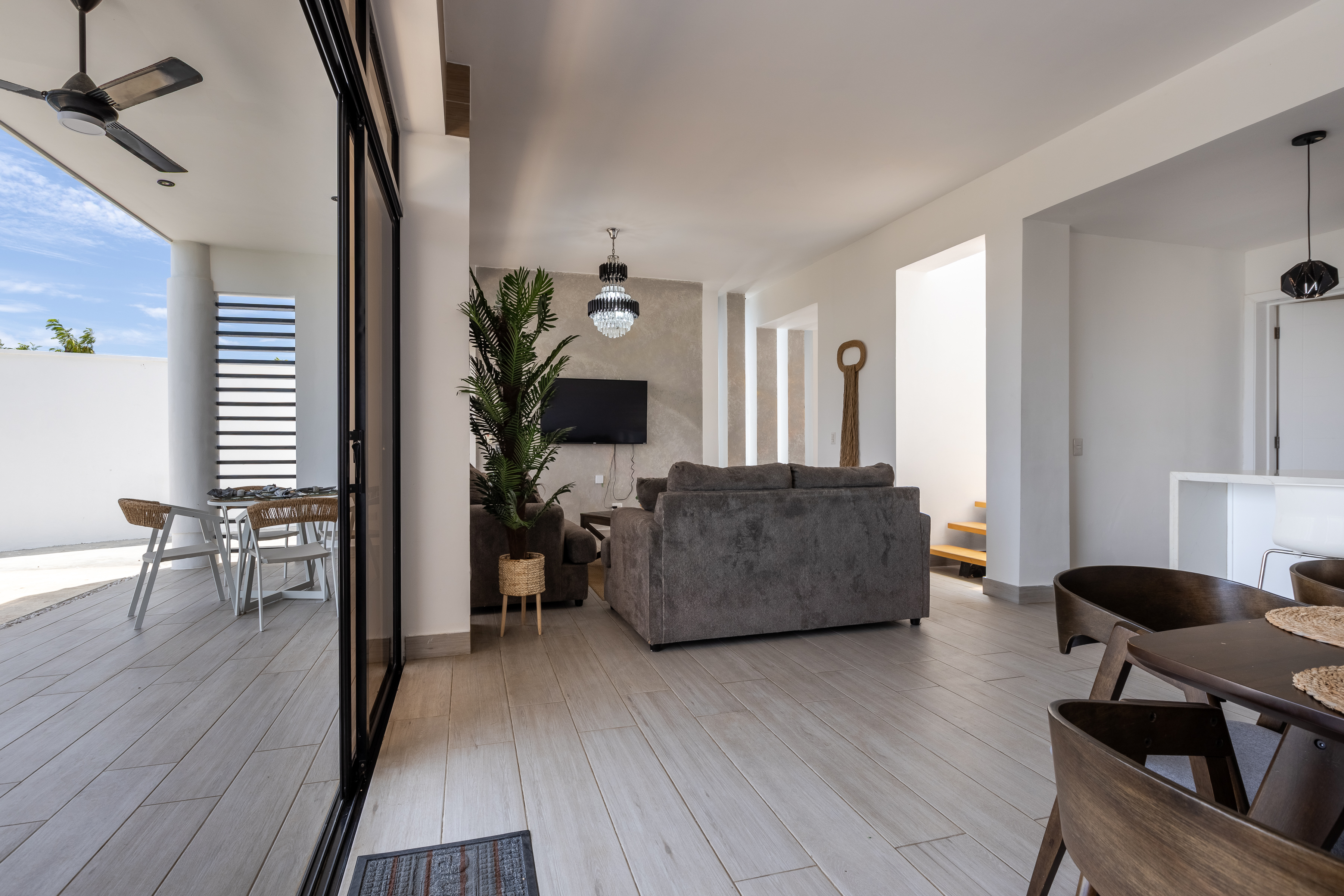 Living room opening to terrace — indoor-outdoor flow