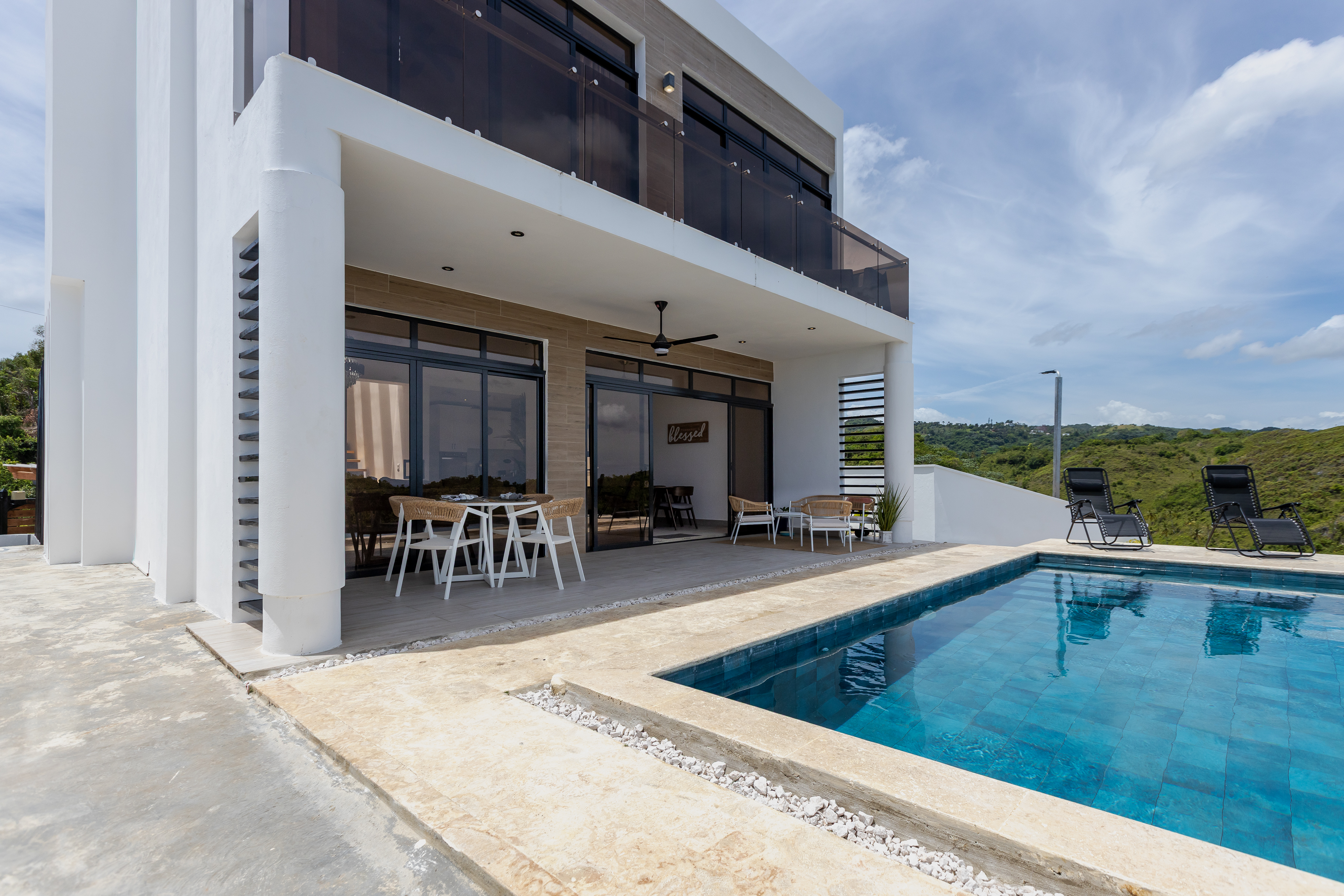 Villa exterior with private pool and covered terrace